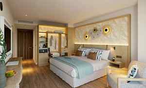 Moderni ja kutsuva kahden hengen huone, jossa on vaaleita puuyksityiskohtia ja pehmeitä värejä. (Tekoälyn luoma teksti)