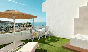 Terassi, jossa aurinkotuoleja, varjo ja pöytä tuoleineen, taustalla merinäköala. (Tekoälyn luoma teksti)