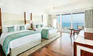 Kahden hengen Deluxe-huone, jossa on queen size -vuoteet