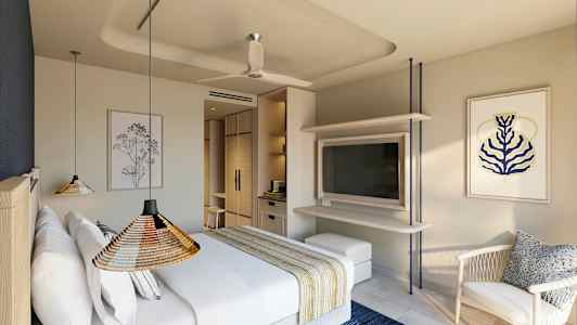 Moderni hotellihuone, jossa parivuode, taideteoksia seinillä ja televisio. (Tekoälyn luoma teksti)