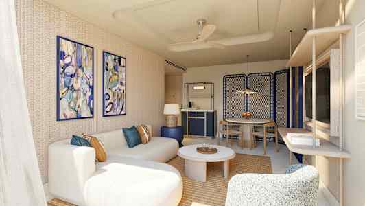 Moderni olohuone, jossa on beige sohva, värikkäitä seinämaalauksia ja pöytä. (Tekoälyn luoma teksti)