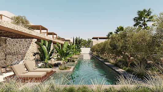 Ulkouima-allas, joka on ympäröity vehreydellä ja kivirakennuksilla. (Tekoälyn luoma teksti)