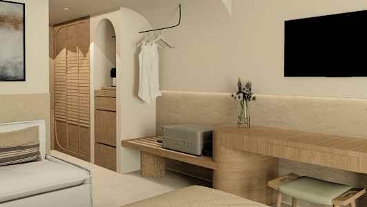 Moderni hotellihuone, jossa oleskelutila, televisio ja vaatekaappi. (Tekoälyn luoma teksti)