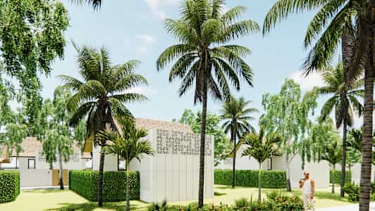 Trooppinen puutarha, jossa palmuja ja pensaita, ympäröitynä valkoisilla rakennuksilla. (Tekoälyn luoma teksti)