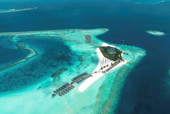 Pieni trooppinen saari, jota ympäröi turkoosi vesi ja riutat. (Tekoälyn luoma teksti)