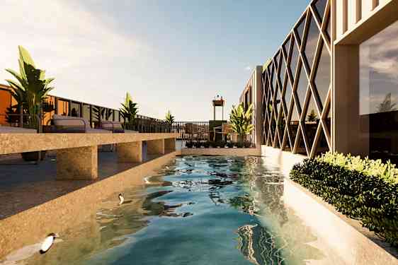 Nykyaikainen terassi, jossa on pitkä uima-allas, jota ympäröivät aurinkotuolit ja kasvit. (Tekoälyn luoma teksti)