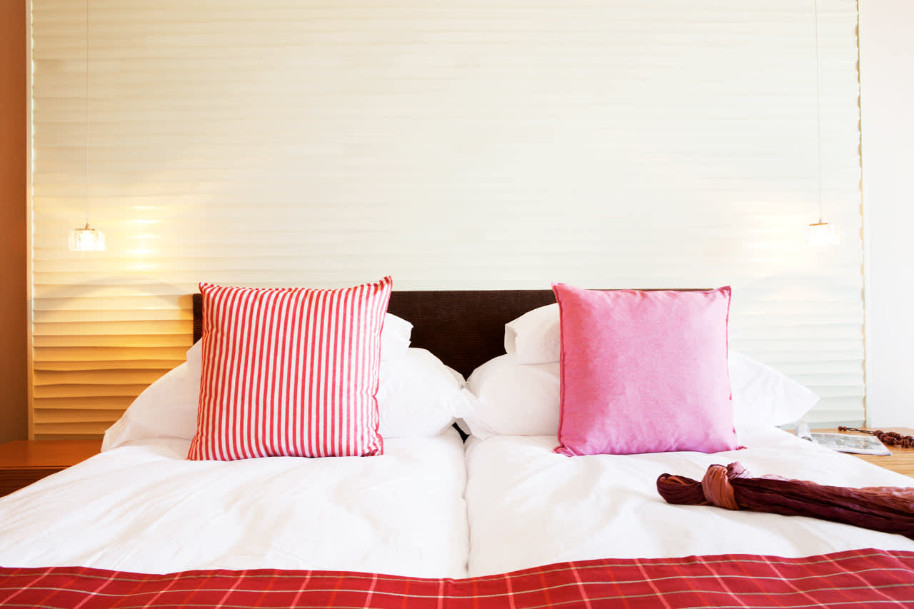 Classic Room -huoneissa on joko parveke tai terassi ja ne ovat sisustukseltaan vaaleat ja modernit.