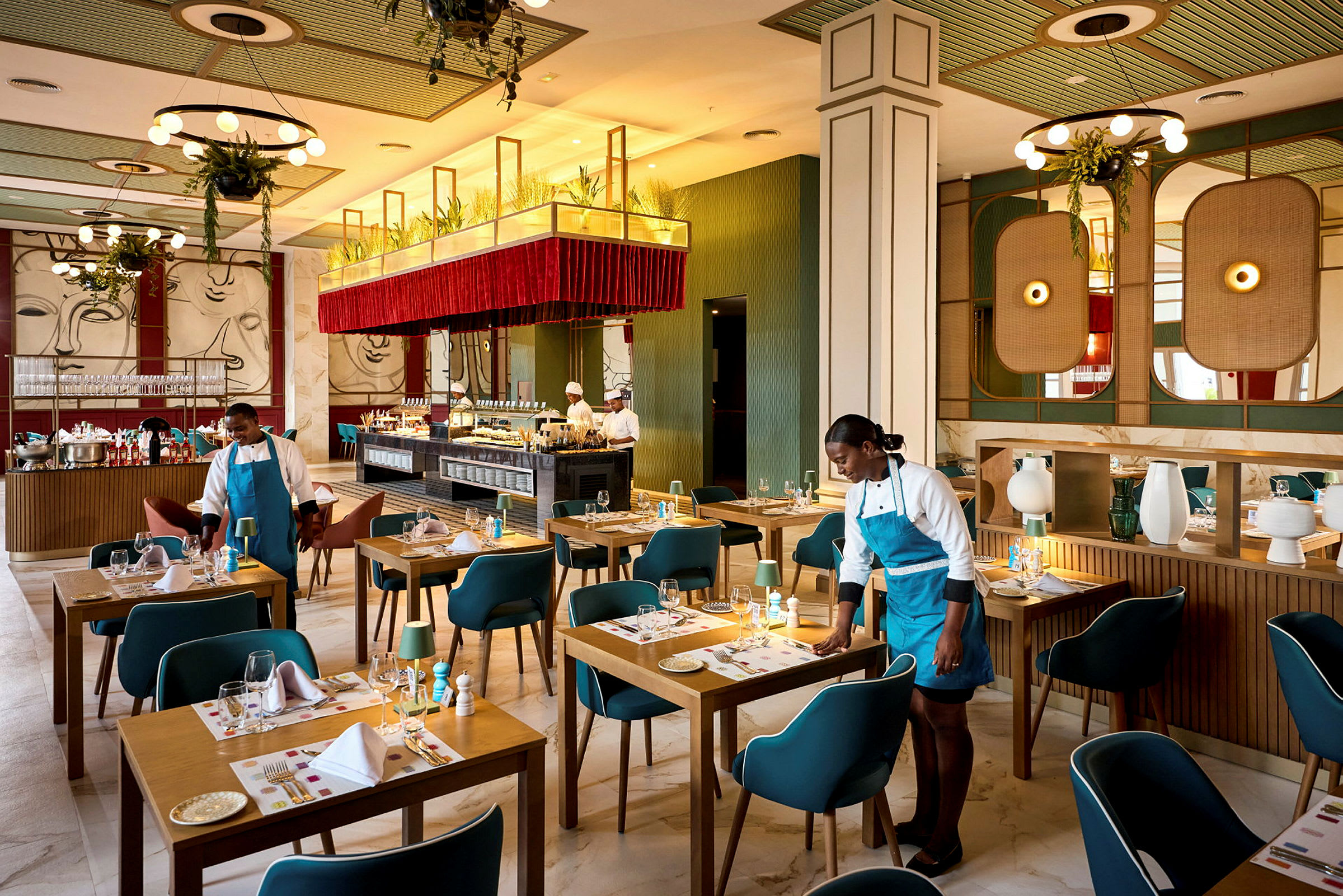Ravintola, jossa on istumapaikkoja ja tarjoilualue. (Tekoälyn luoma teksti)